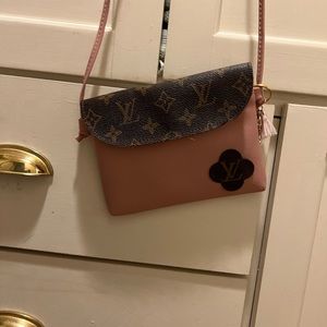 Genuine leather and authentic Louie canvas